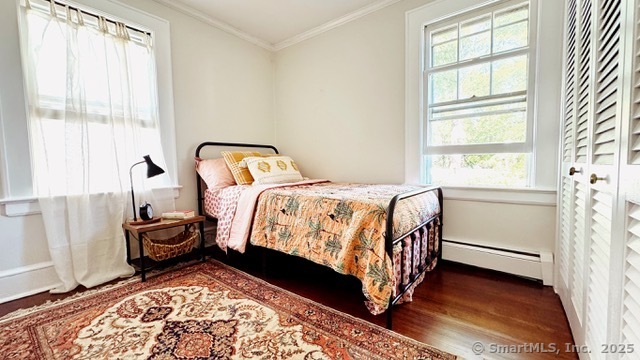 89 Richmond Hill Road New Canaan, CT 06840 - Photo 7 of 17 a bedroom with a bed and a window