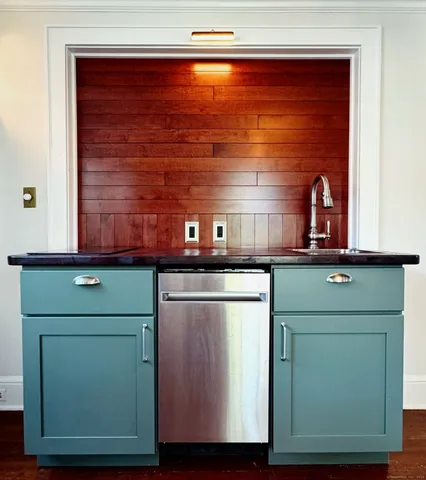 a kitchen with a sink and a cabinets