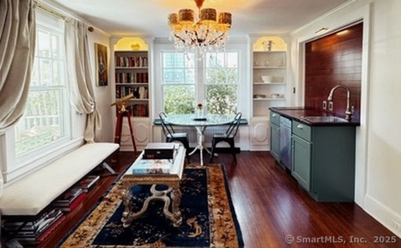 89 Richmond Hill Road New Canaan, CT 06840 - Photo 10 of 17 a living room with furniture and a large window