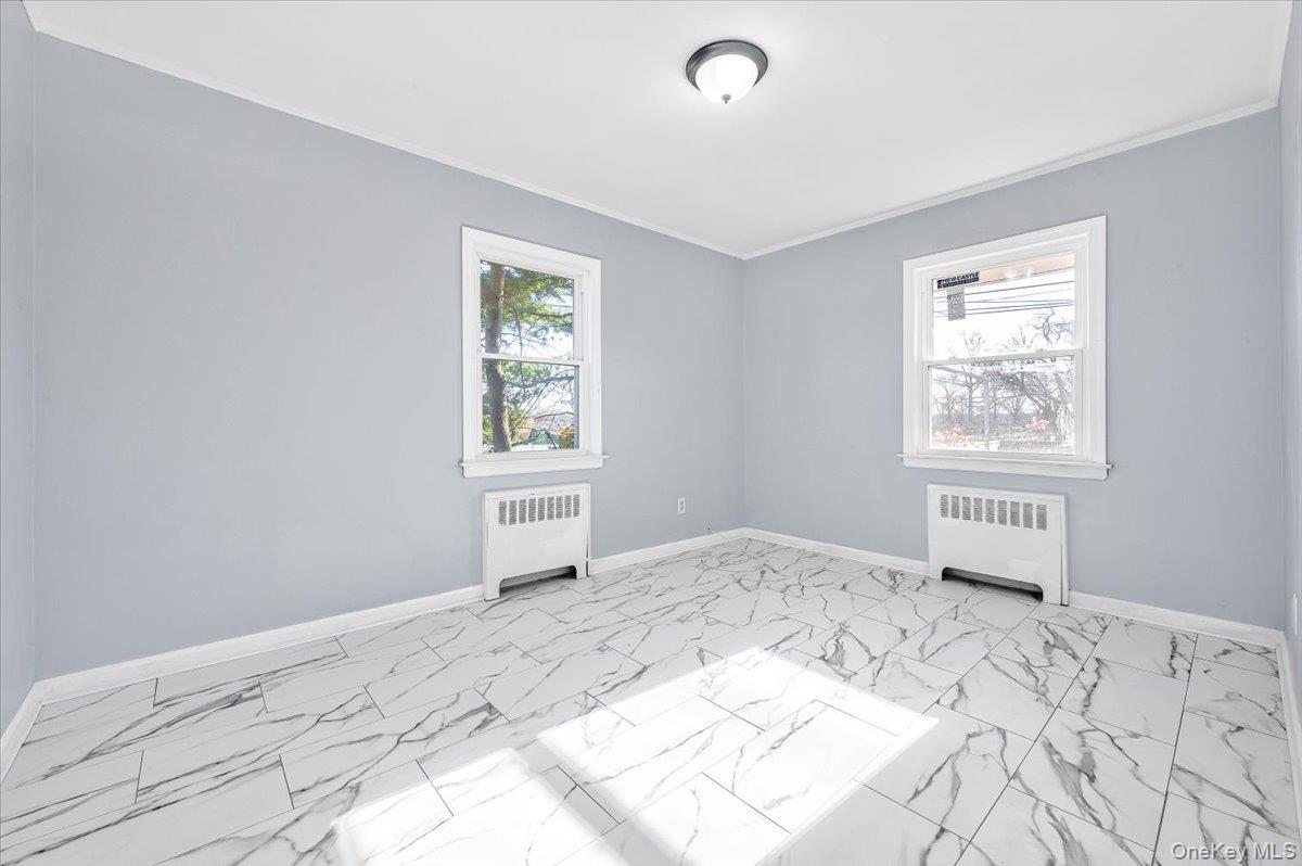 95 Harold Avenue Hempstead, NY 11550 - Photo 14 of 29 a view of a bedroom