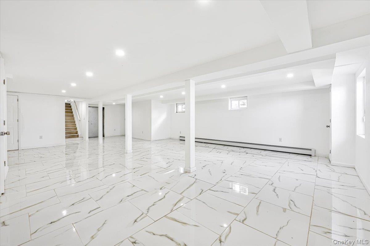 95 Harold Avenue Hempstead, NY 11550 - Photo 19 of 29 a view of a kitchen with a stove