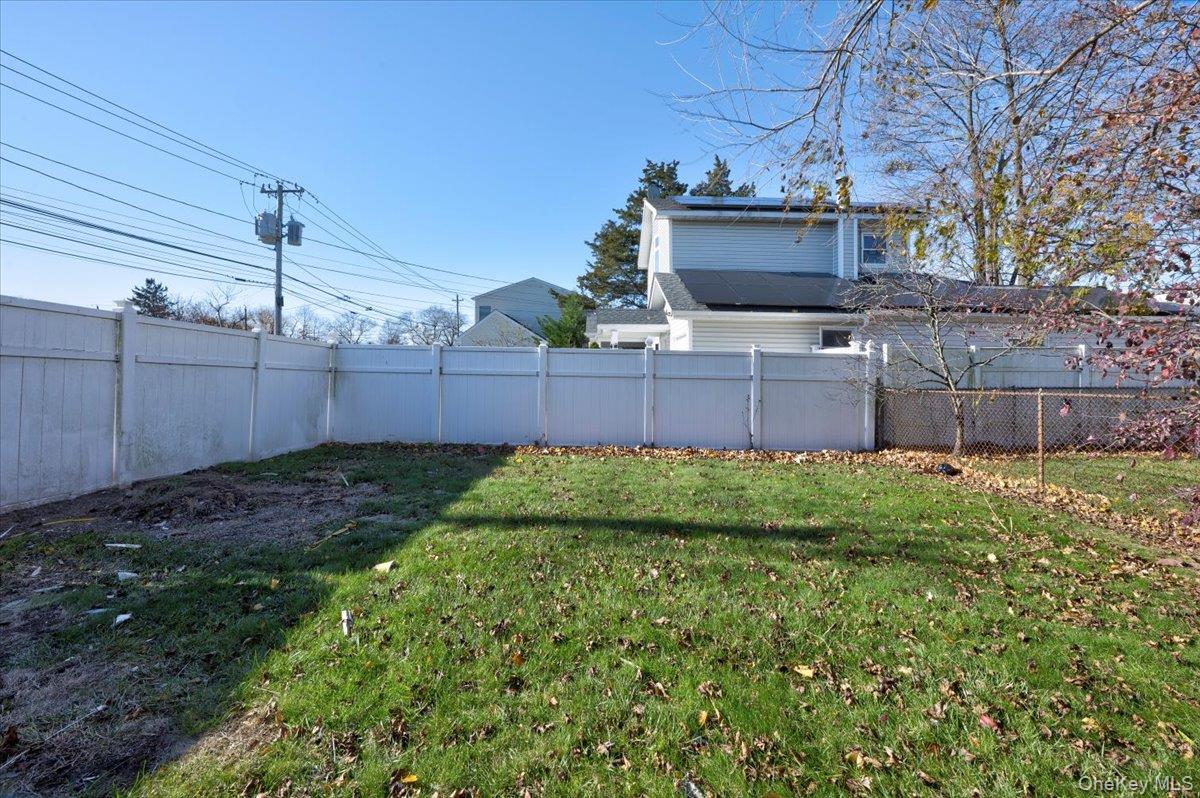95 Harold Avenue Hempstead, NY 11550 - Photo 23 of 29 a view of a backyard