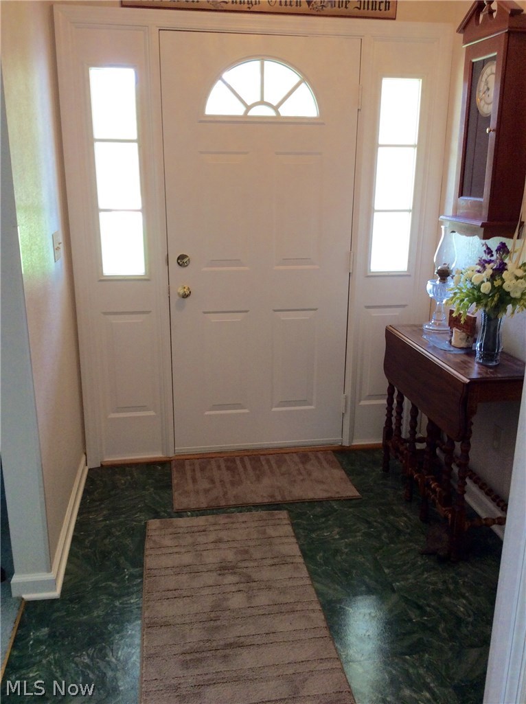 188 Ledge Road Macedonia, OH 44056 - Photo 7 of 23 FOYER WITH ENTRY CLOSET WILL LEAD YOU TO THE LIVING ROOM, FAMILY ROOM OR BEDROOM WING.