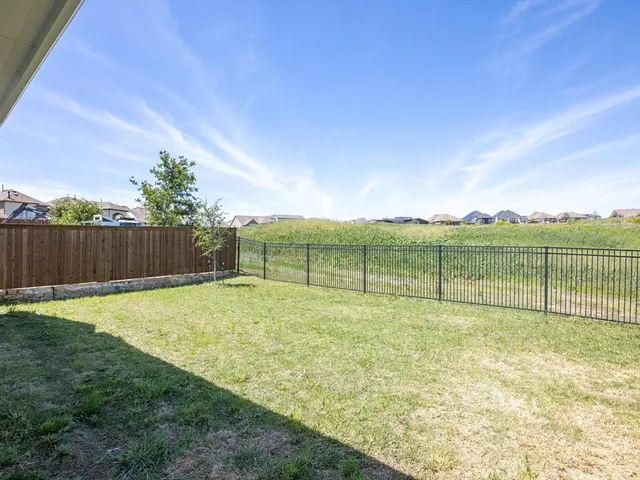a view of an outdoor space and a yard