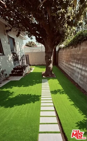a garden view with a fountain