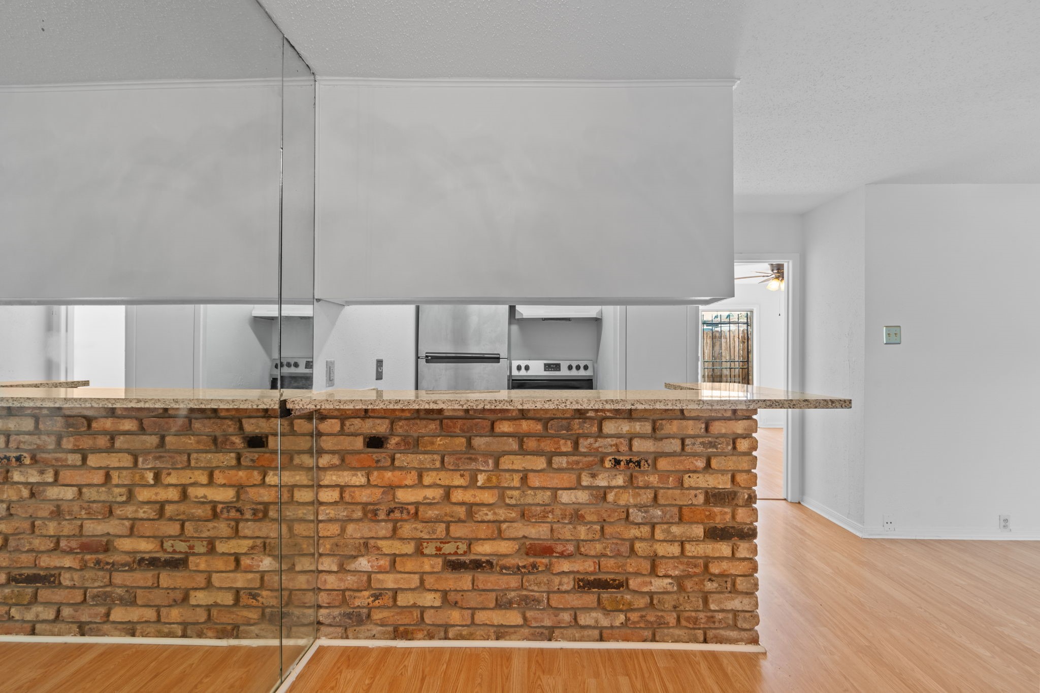 1849 Marshall Street, Unit 9 Houston, TX 77098 - Photo 7 of 24 a bathroom with a sink and a mirror