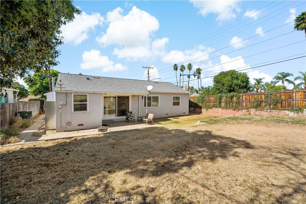 6006 Colonial Drive Riverside, CA 92506 - Photo 27 of 36 a front view of a house with a yard