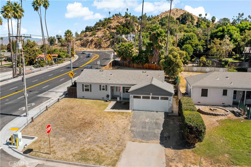 6006 Colonial Drive Riverside, CA 92506 - Photo 34 of 36 a view of a house with a backyard