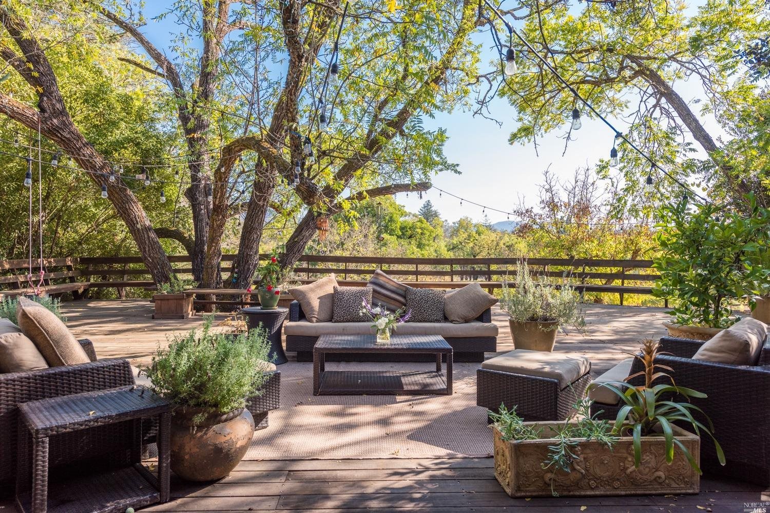 a outdoor living space with patio and furniture
