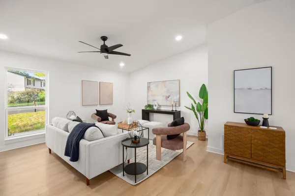 a living room with furniture and a window