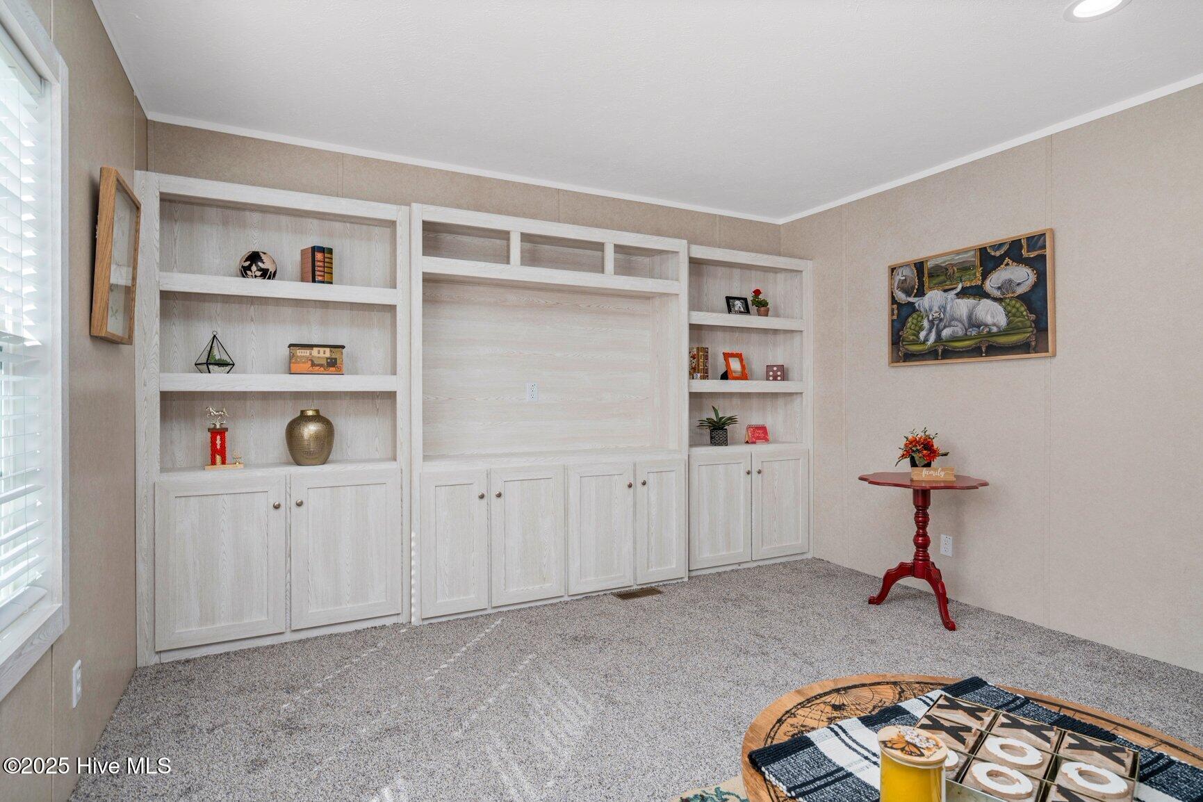 6167 Taylors Gin Road Castalia, NC 27816 - Photo 19 of 37 Built In Entertainment Center