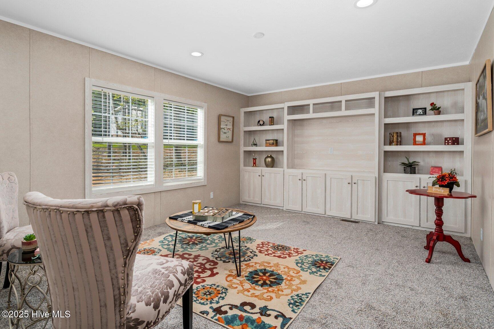 6167 Taylors Gin Road Castalia, NC 27816 - Photo 20 of 37 Den with Entertainment Center