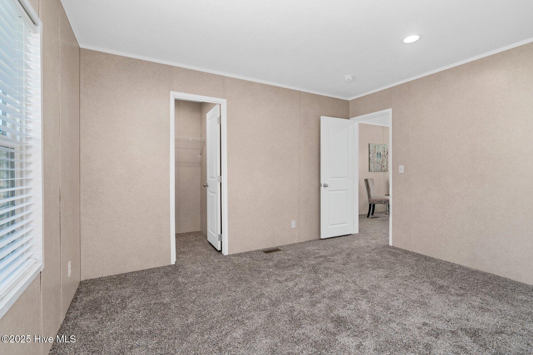 6167 Taylors Gin Road Castalia, NC 27816 - Photo 22 of 37 Bedroom 2 with Walk In Closet