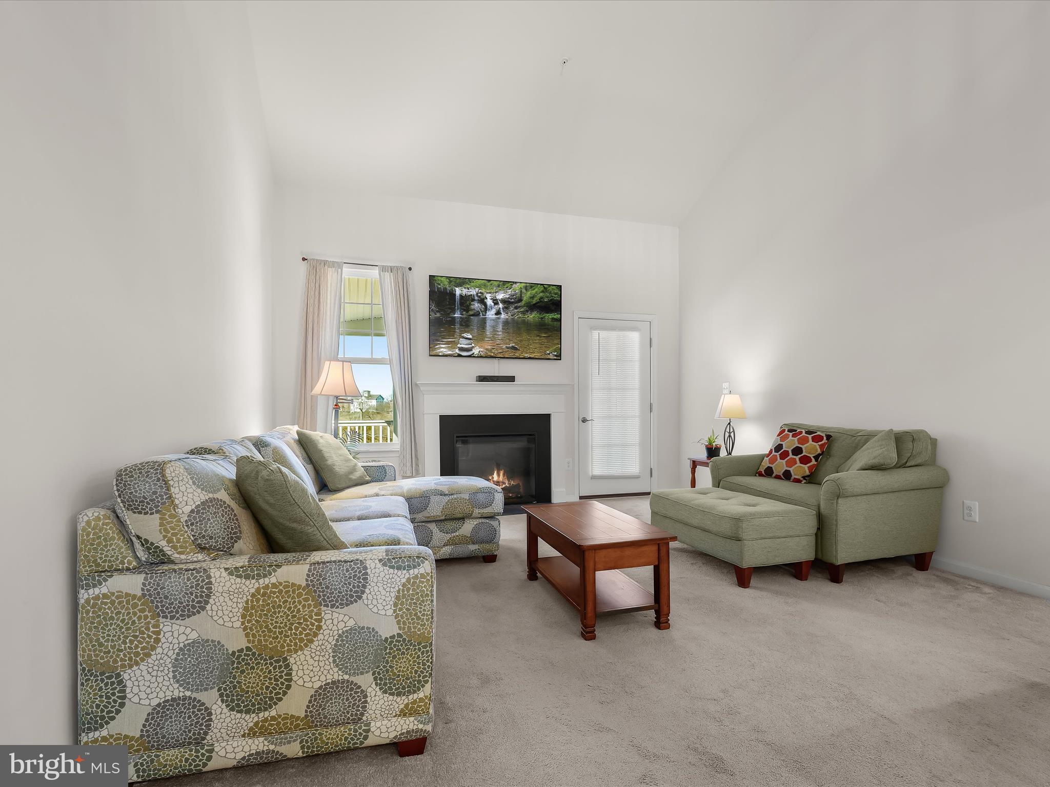 2876 Union Square Road, Unit 22 New Windsor, MD 21776 - Photo 15 of 57 Living Room - Fireplace - Access to Screened Deck
