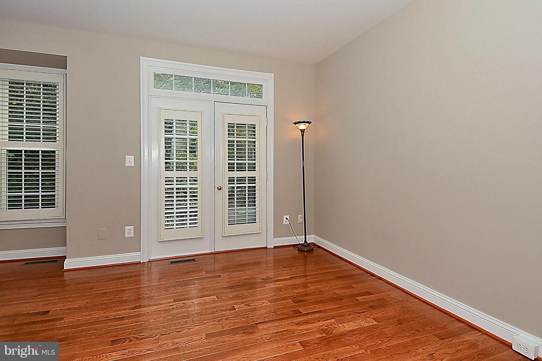 11420 Summer House Court Reston, VA 20194 - Photo 10 of 30 Family Room Leads to Deck