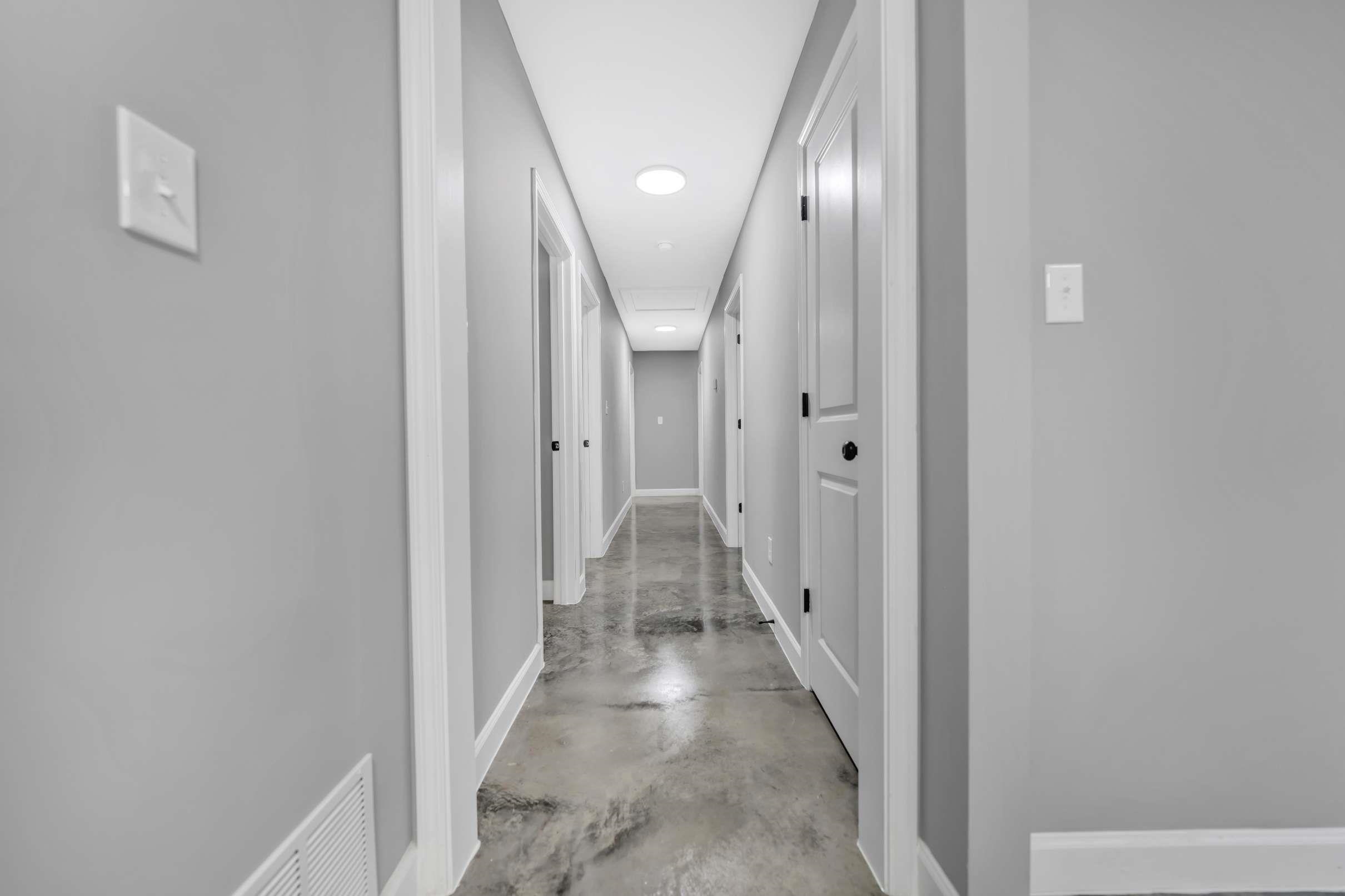 5694 Myers Road Memphis, TN 38115 - Photo 4 of 4 a view of a hallway with wooden floor