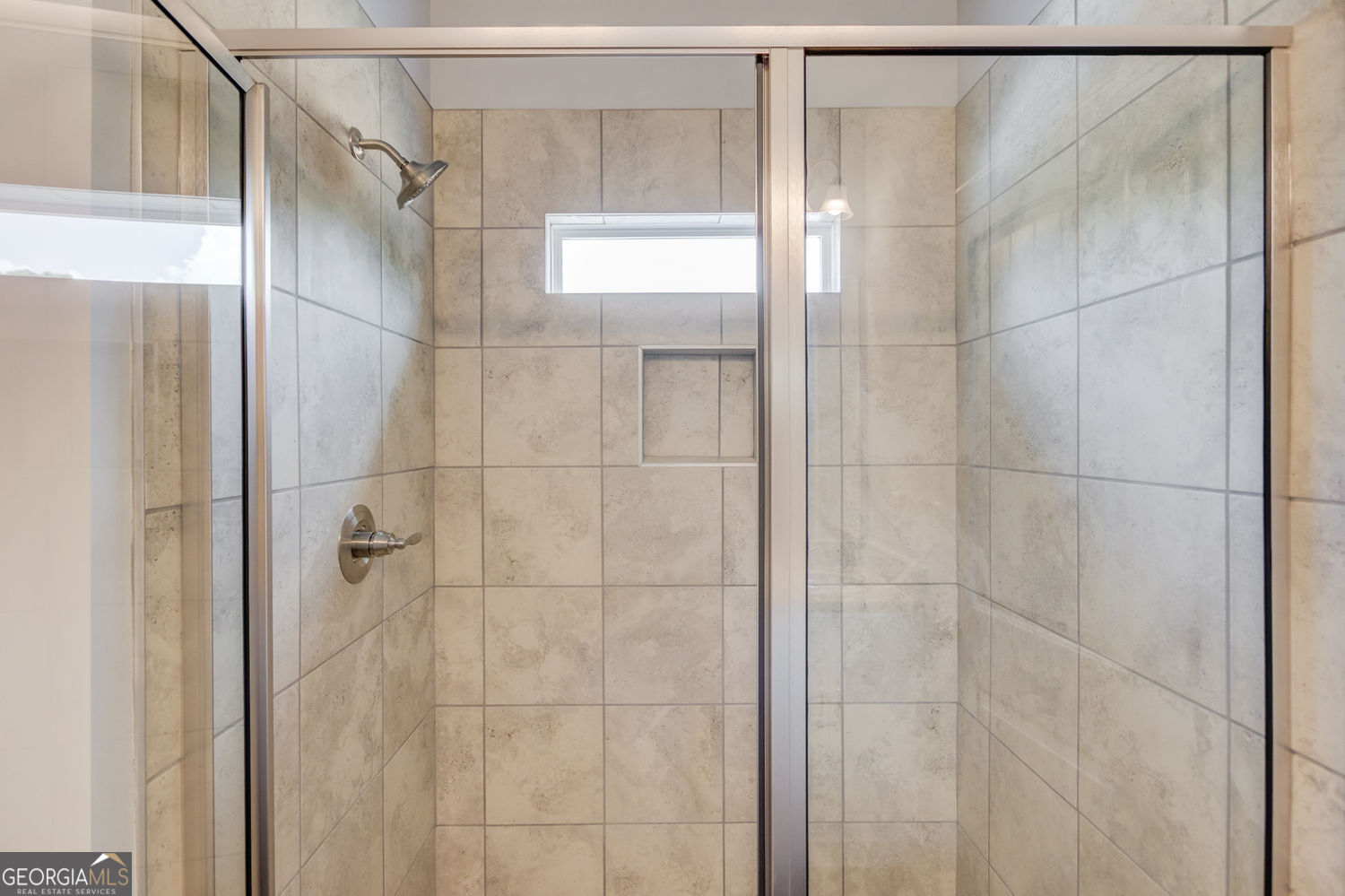 0 Harvest Church Road Clarkesville, GA 30523 - Photo 25 of 38 a bathroom with a glass shower door