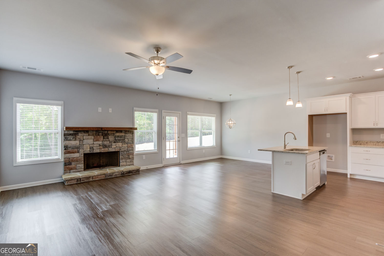0 Harvest Church Road Clarkesville, GA 30523 - Photo 9 of 38 a view of a kitchen with a sink a fireplace and wooden floor