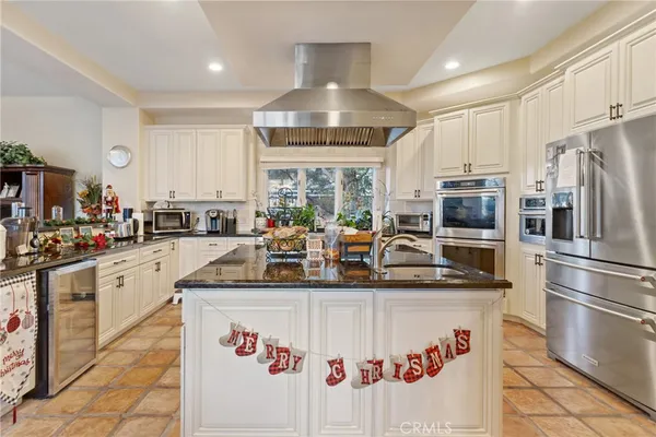 a kitchen with counter space cabinets and appliances
