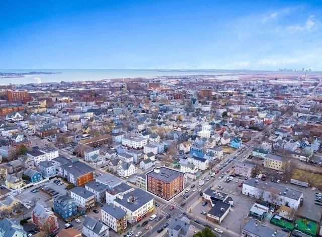 an aerial view of a city with lots of residential buildings