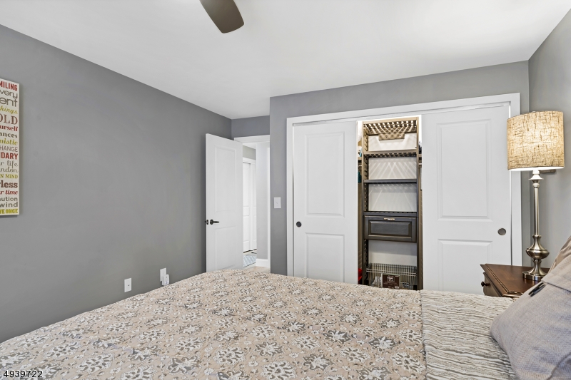 323 Sparrow Court Three Bridges, NJ 08887 - Photo 12 of 20 a bedroom with a bed and painting on the wall