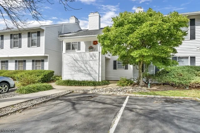 a house with trees in the background