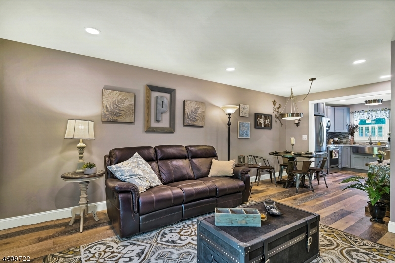 323 Sparrow Court Three Bridges, NJ 08887 - Photo 6 of 20 a living room with furniture and wooden floor