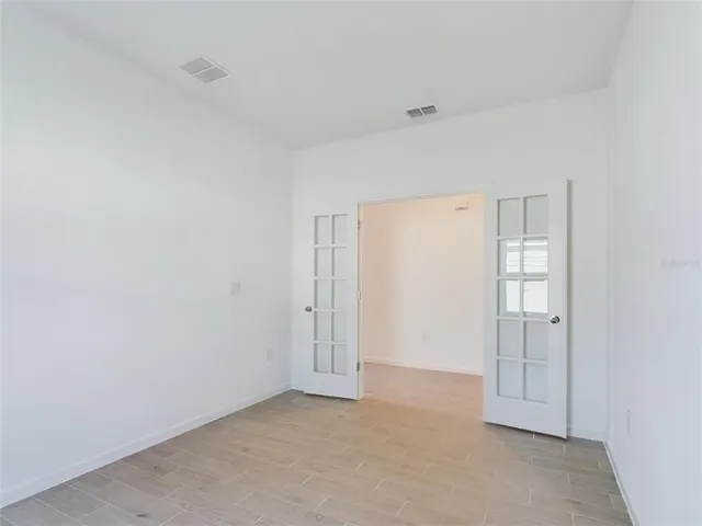 an empty room with windows