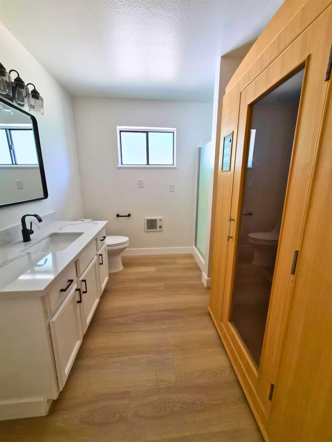21640 Clute Canyon Road Volcano, CA 95689 - Photo 10 of 44 a spacious bathroom with a double vanity sink and a mirror