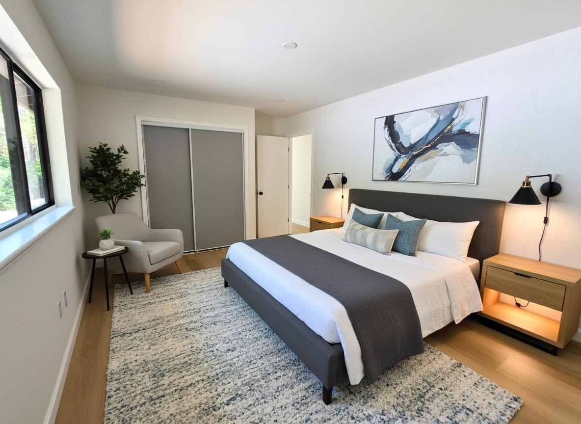 21640 Clute Canyon Road Volcano, CA 95689 - Photo 12 of 44 a bedroom with a bed a couch and potted plant