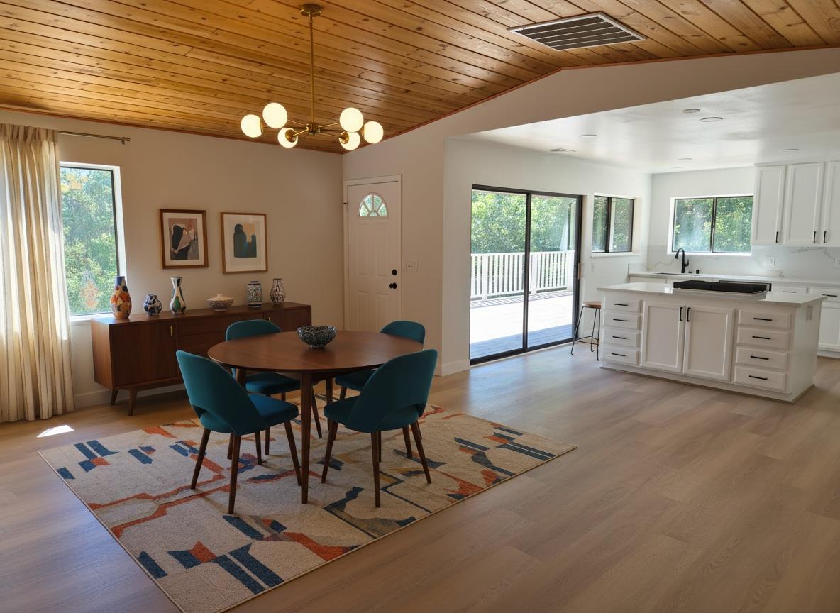 21640 Clute Canyon Road Volcano, CA 95689 - Photo 15 of 44 a view of a dining room with furniture and window
