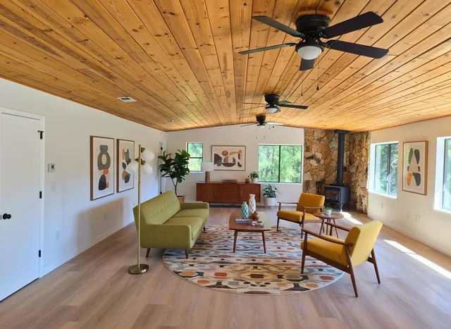 a view of a livingroom with wooden floor