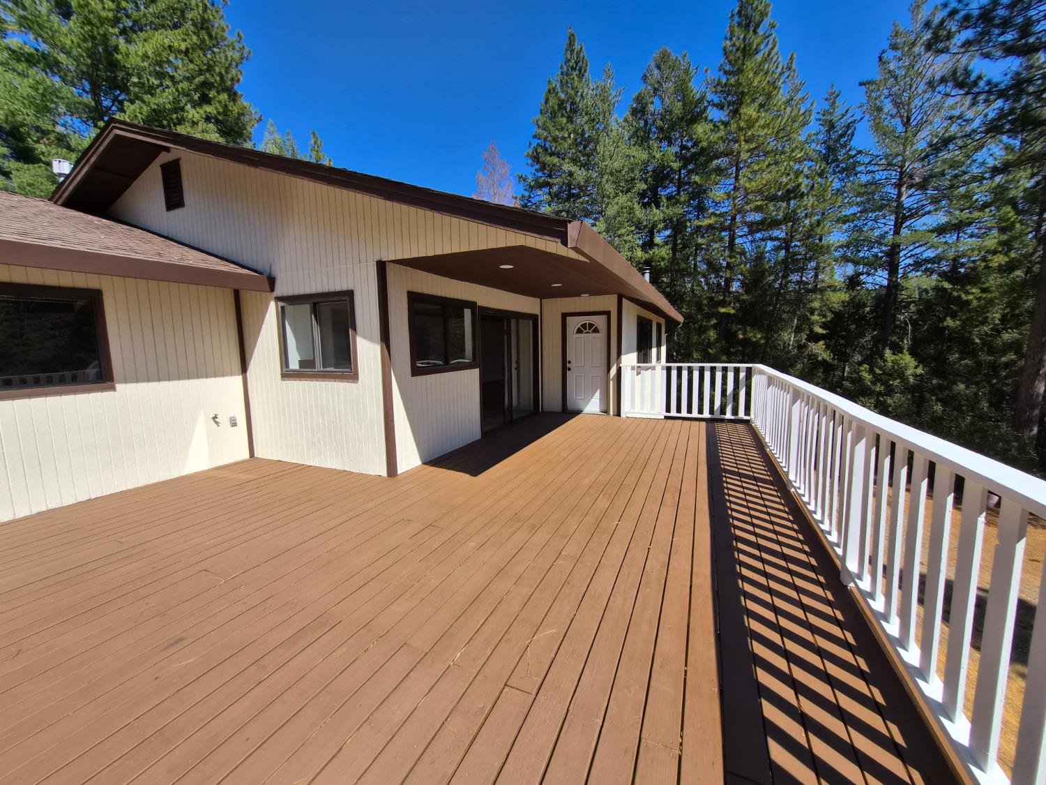 21640 Clute Canyon Road Volcano, CA 95689 - Photo 26 of 44 a view of a house with a deck