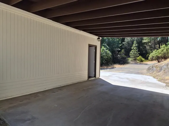 a house view with a backyard space