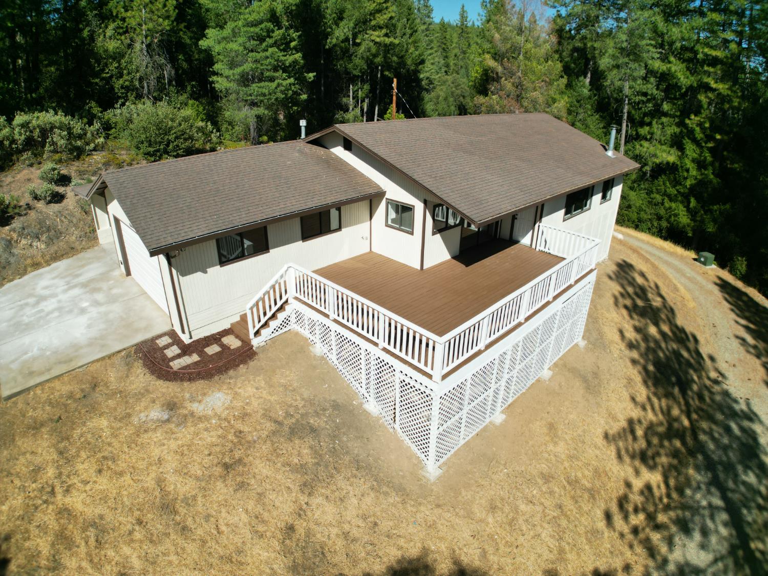 21640 Clute Canyon Road Volcano, CA 95689 - Photo 40 of 44 an aerial view of a house with yard and garage