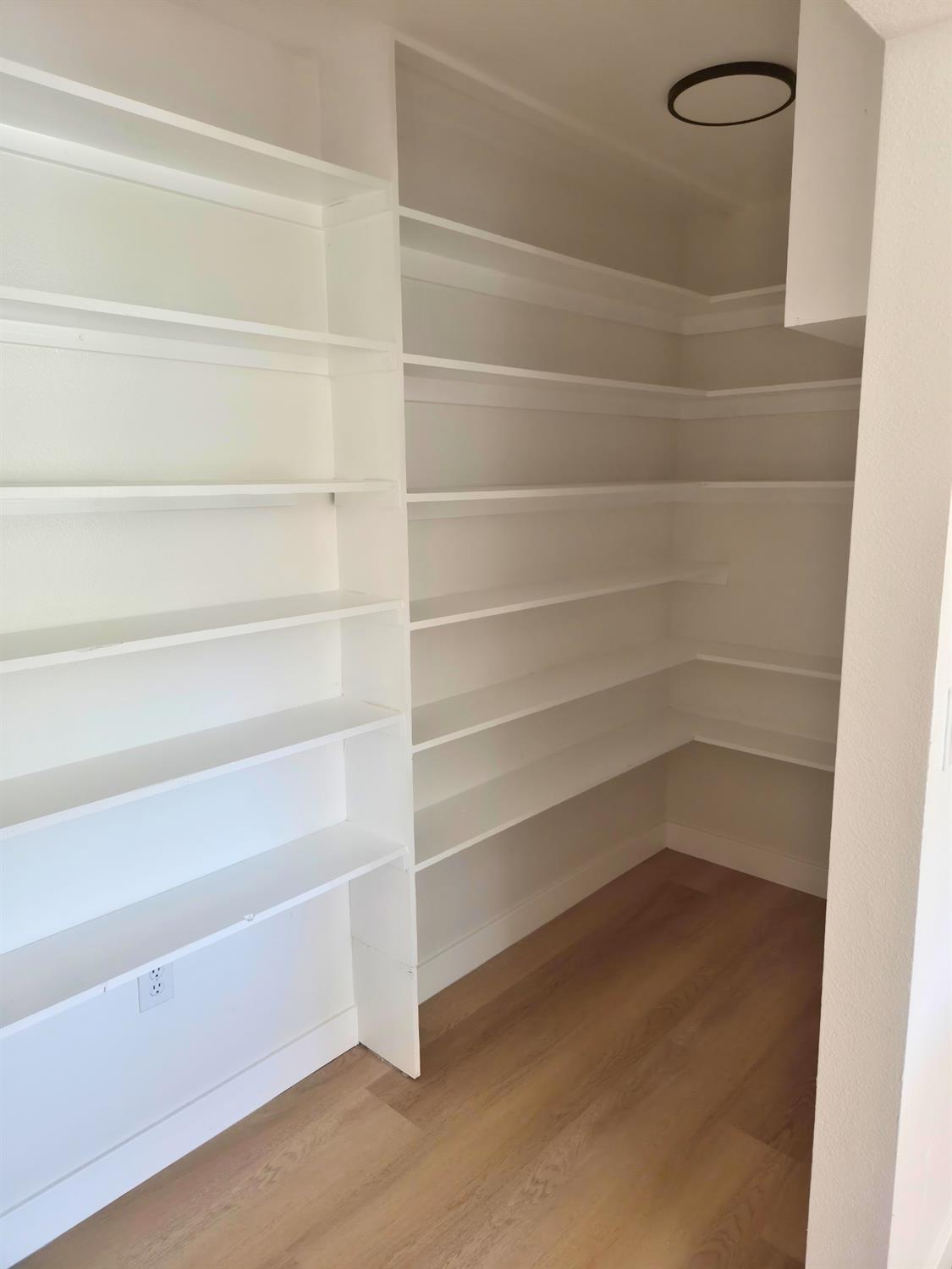 21640 Clute Canyon Road Volcano, CA 95689 - Photo 5 of 44 a view of a room with empty racks