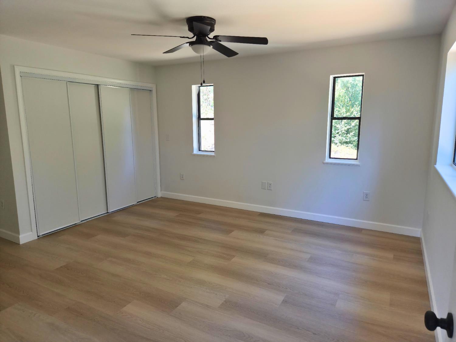 21640 Clute Canyon Road Volcano, CA 95689 - Photo 8 of 44 a view of empty room with windows