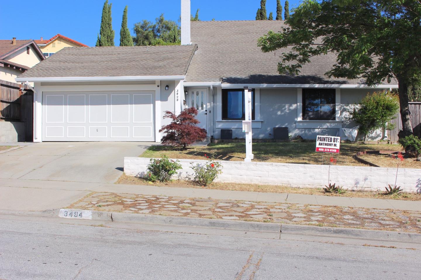3494 Tokay Way San Jose, CA 95148 - Photo 1 of 25 a front view of a house with a yard and potted plants