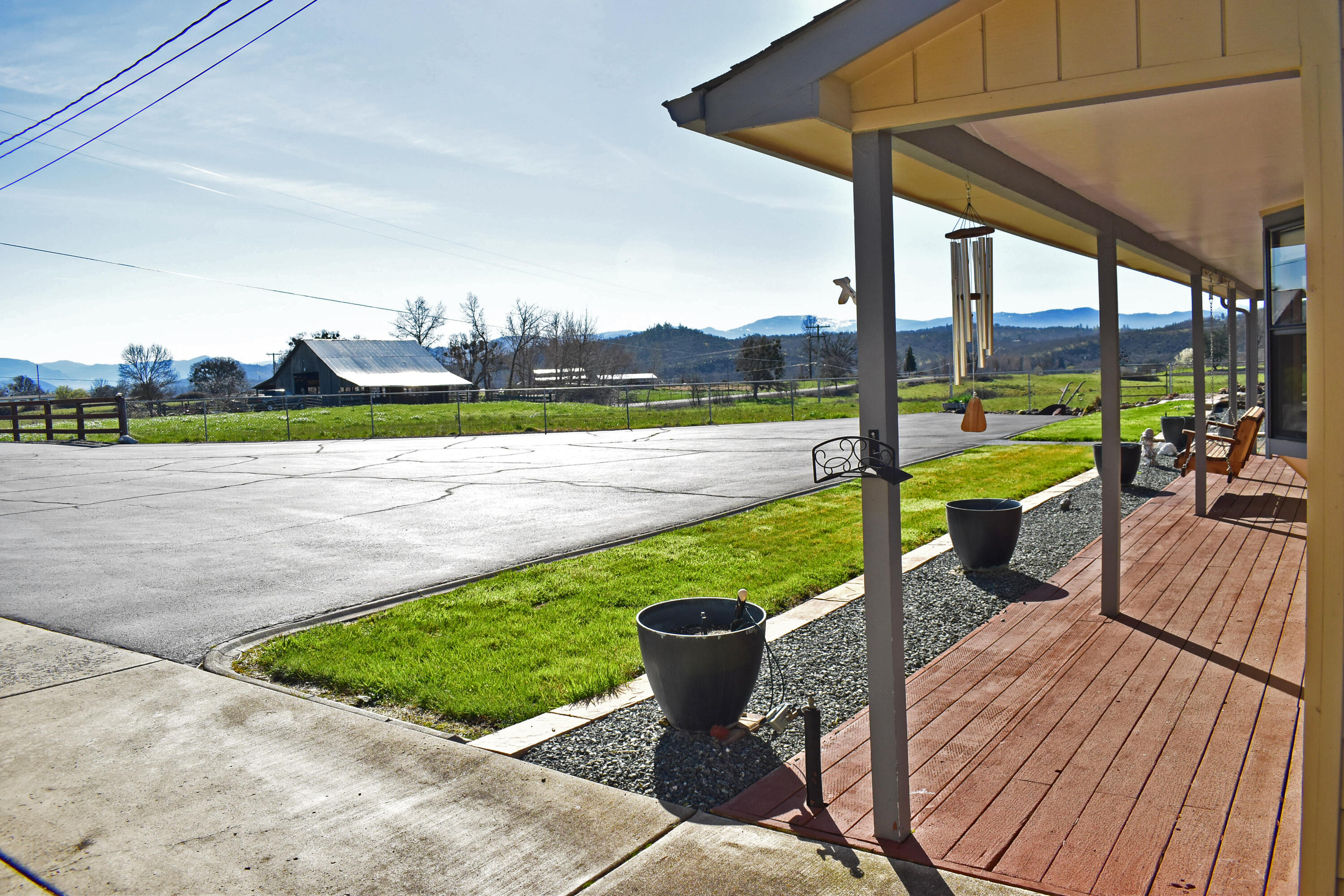 865 Reese Creek Road Eagle Point, OR 97524 - Photo 10 of 37 a view of a swimming pool with a patio