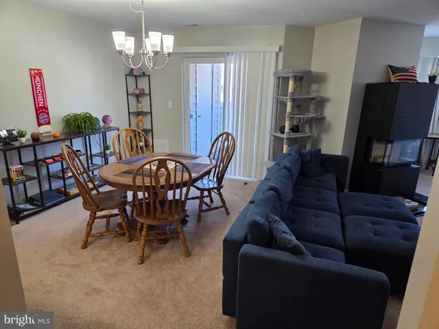 a view of a livingroom and dining room