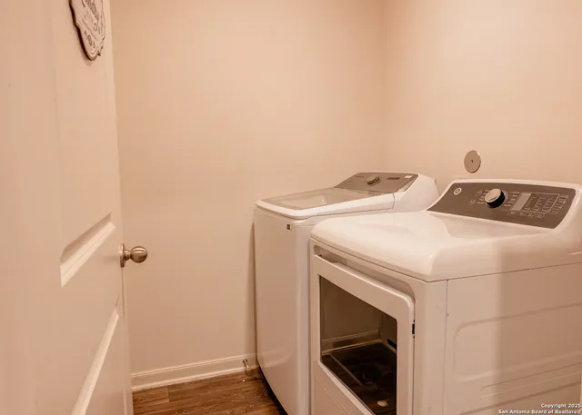 a utility room with dryer and washer