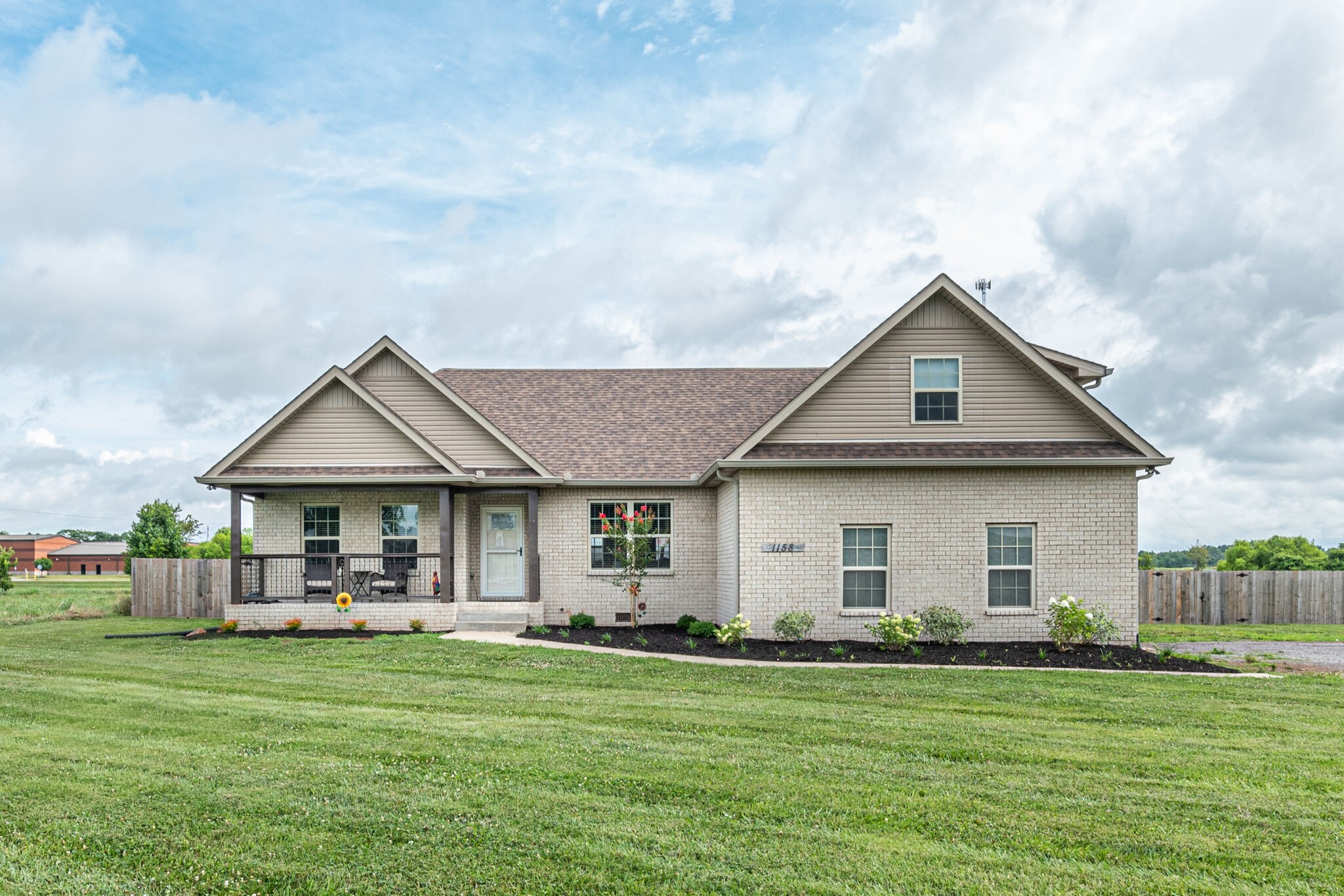 1158 Payne Road Portland, TN 37148 - Photo 1 of 31 a front view of a house with a garden