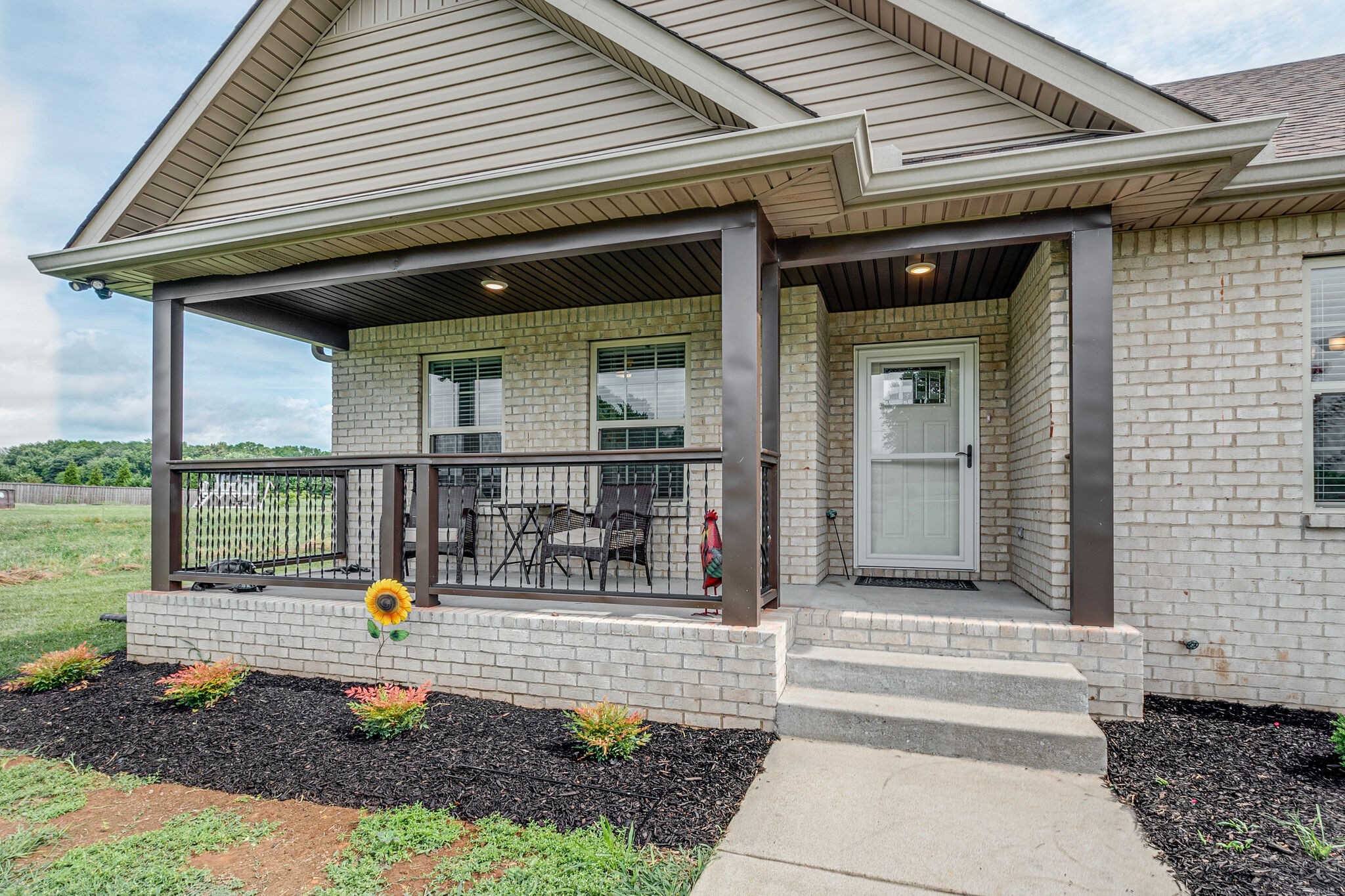 1158 Payne Road Portland, TN 37148 - Photo 2 of 31 a front view of a house with a garden