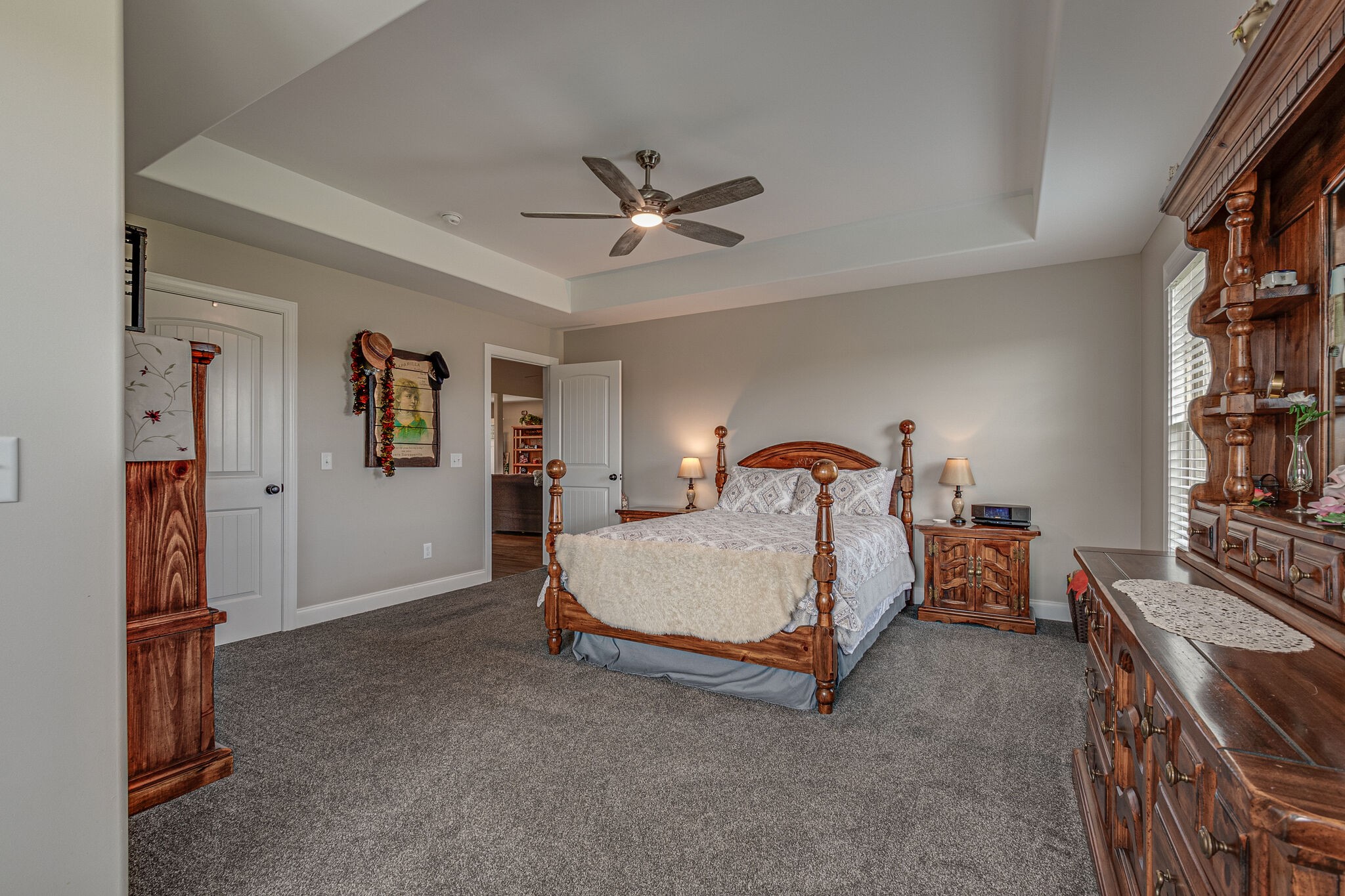 1158 Payne Road Portland, TN 37148 - Photo 18 of 31 a bed room with a bed and a chandelier