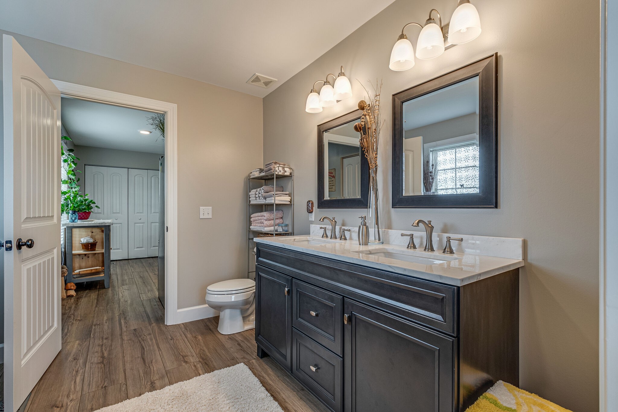 1158 Payne Road Portland, TN 37148 - Photo 19 of 31 a bathroom with a toilet sink and mirror