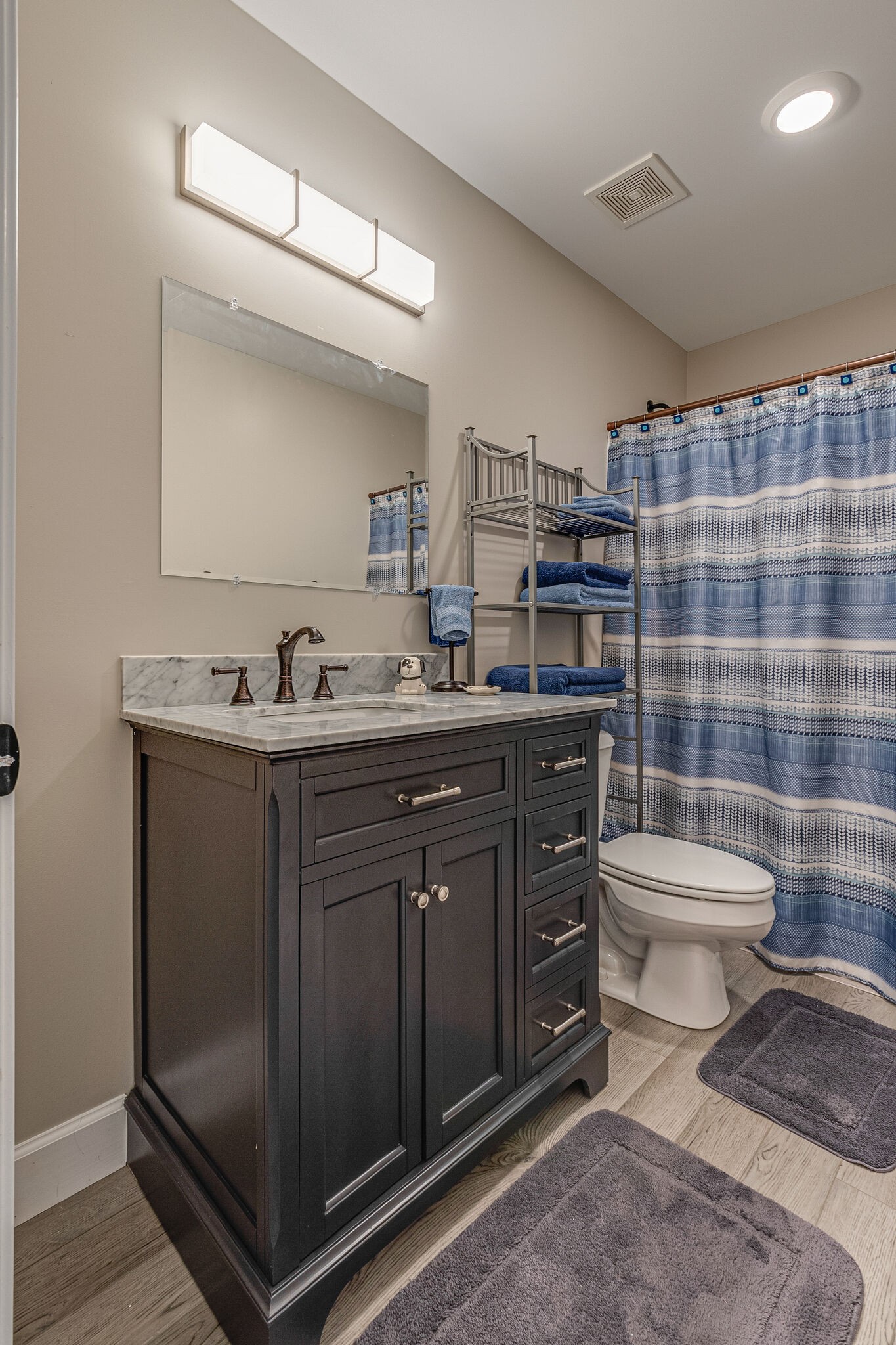 1158 Payne Road Portland, TN 37148 - Photo 23 of 31 a bathroom with a sink a toilet and shower