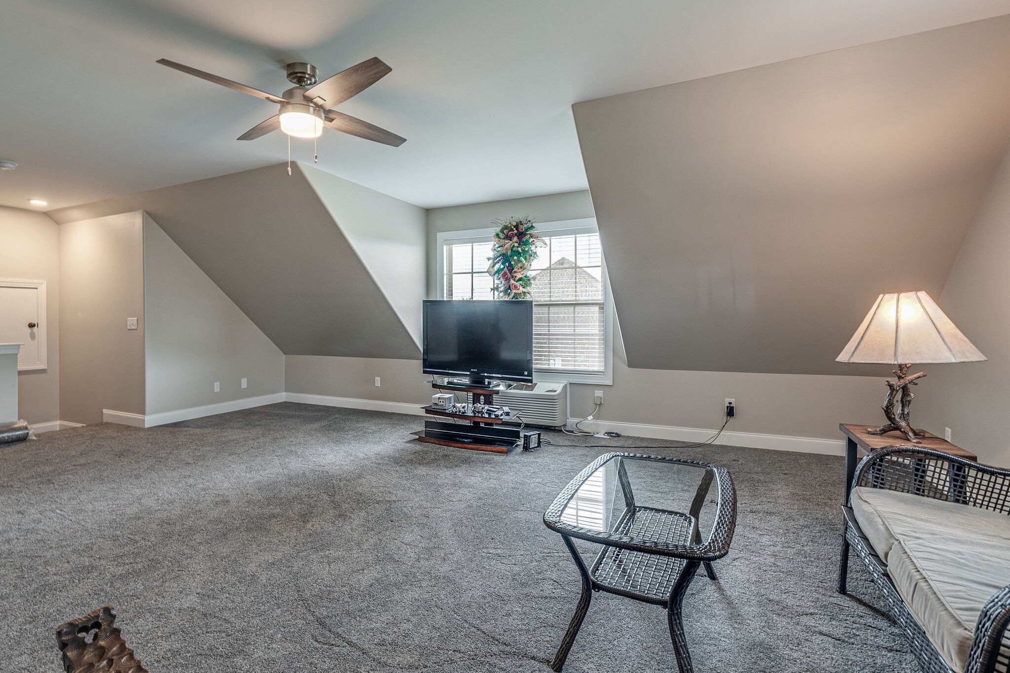 1158 Payne Road Portland, TN 37148 - Photo 26 of 31 a living room with furniture and a lamp