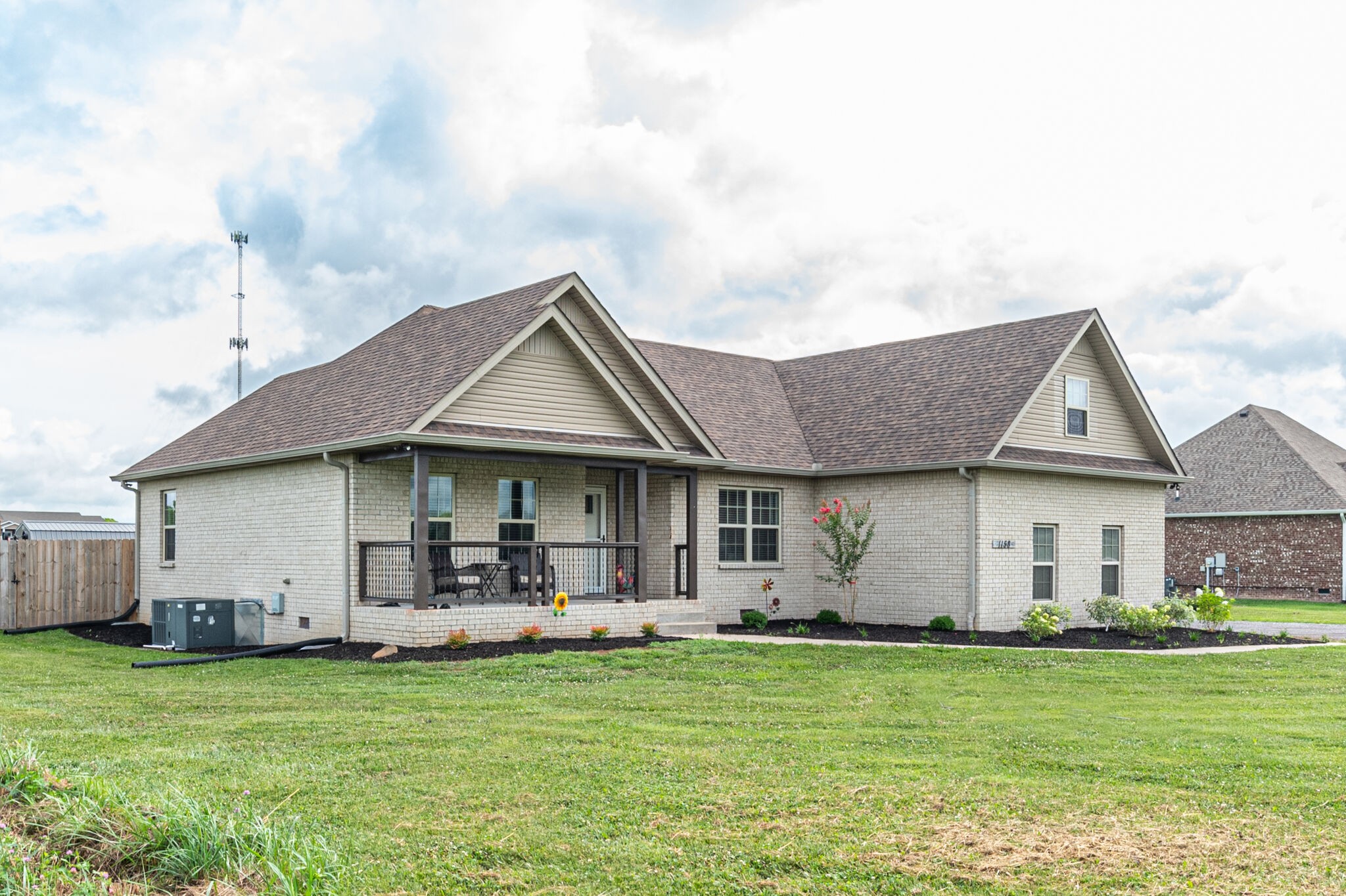 1158 Payne Road Portland, TN 37148 - Photo 4 of 31 a front view of a house with a garden