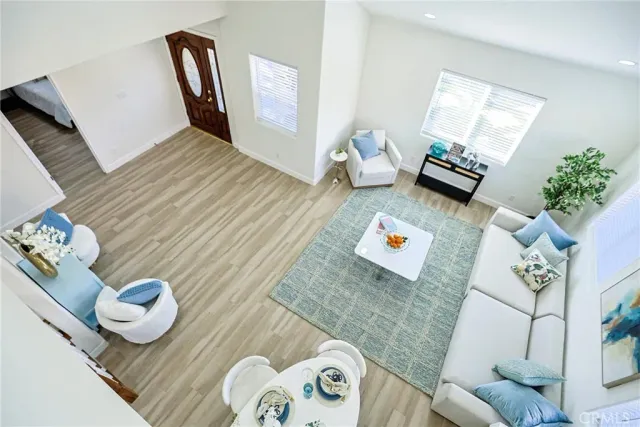 a kitchen with stainless steel appliances a refrigerator sink stove microwave and cabinets