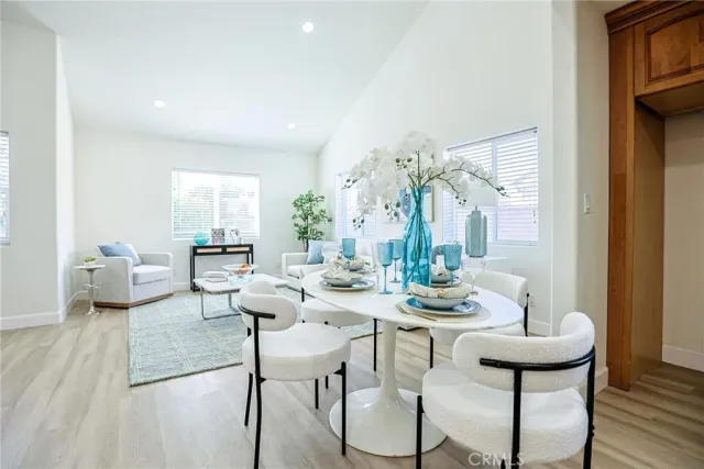 a kitchen with a table and chairs in it
